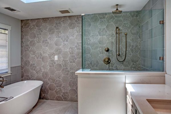 Tommy Bath – Featuring AKDO Heritage hex wall tile and Mansion floor tile, Brizo plumbing