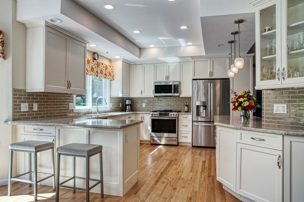 BV Traditional Kitchen – Featuring cabinetry by Europa with painted finish, Walker Zanger tile, Gramercy Park used as backsplash. Countertops by Cambria in the color of Windermere.